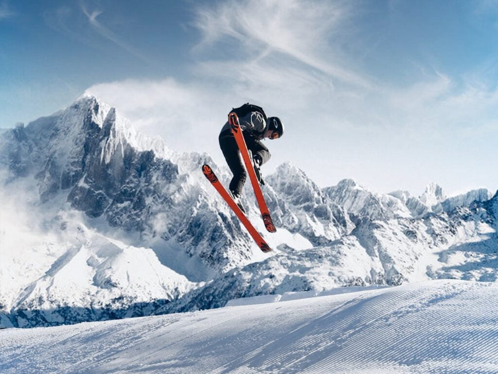 A outdoor enthusiasts skiing in the snow