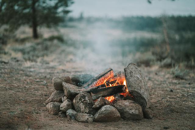 Fire in the wood. Camping in a cabin